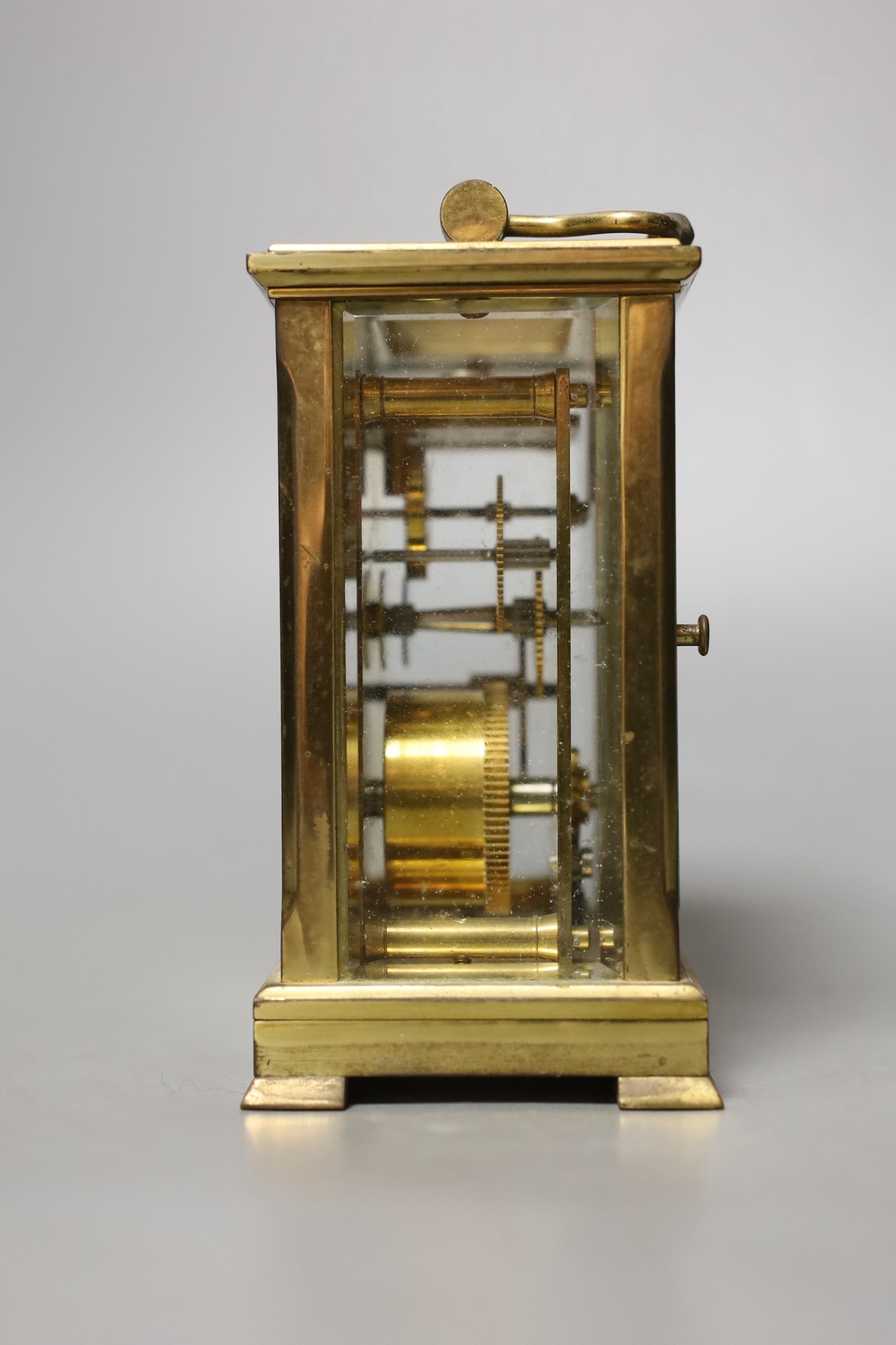 A Dent retailed brass carriage timepiece, 12 cms high.